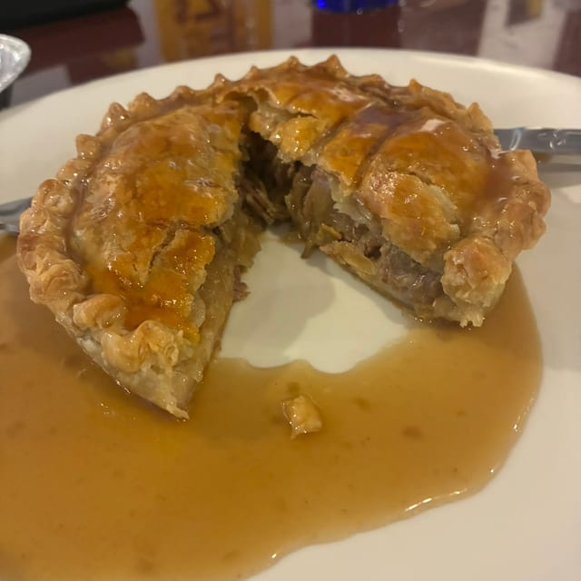 Steak And Ale Pie - Served With Side Of Gravy.